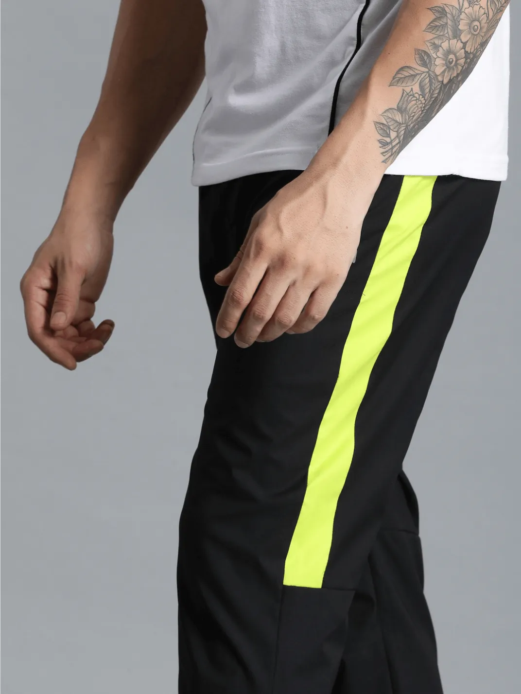 Harold Solid Regular fit Polyester Trackpants for Men with zipper pockets Comfortable Breathable Fabric Stretchable for Everyday Use Ideal for Yoga Training Gym Running or Performance