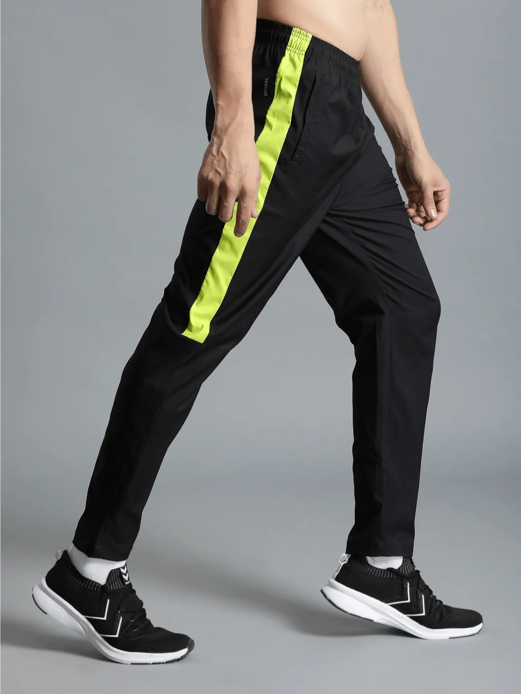 Harold Solid Regular fit Polyester Trackpants for Men with zipper pockets Comfortable Breathable Fabric Stretchable for Everyday Use Ideal for Yoga Training Gym Running or Performance